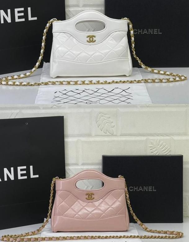 Chanel quilted leather cut out top handle handbag with gold CC logo and chain strap in white and pink by Meya Luxury Brand