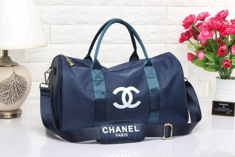 Navy blue luxury nylon travel duffle bag with padded shoulder strap