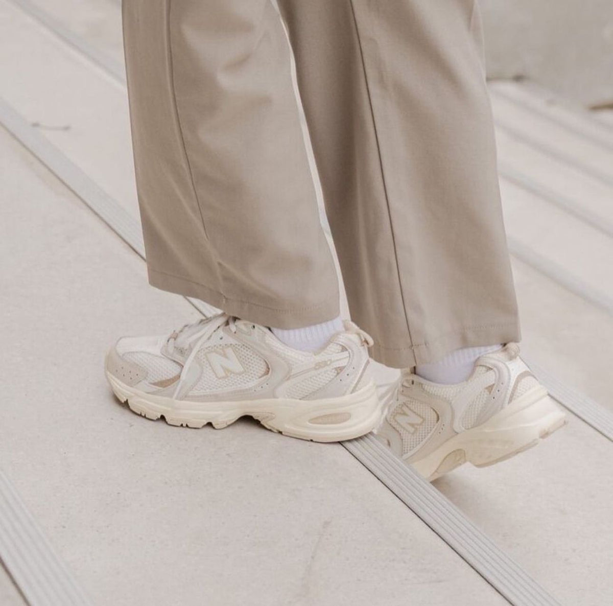 Beige New Balance 9060 sneakers shown on foot