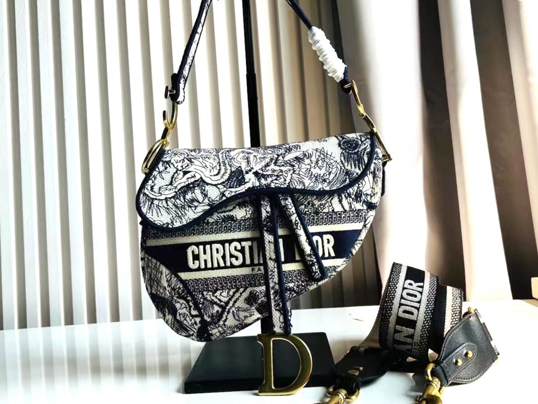 CHRISTIAN DIOR Canvas Embroidered Around the World Saddle Bag - Meya Luxury Brand