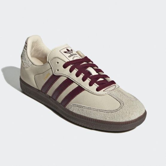 Side-angle view of cream Adidas Samba sneaker