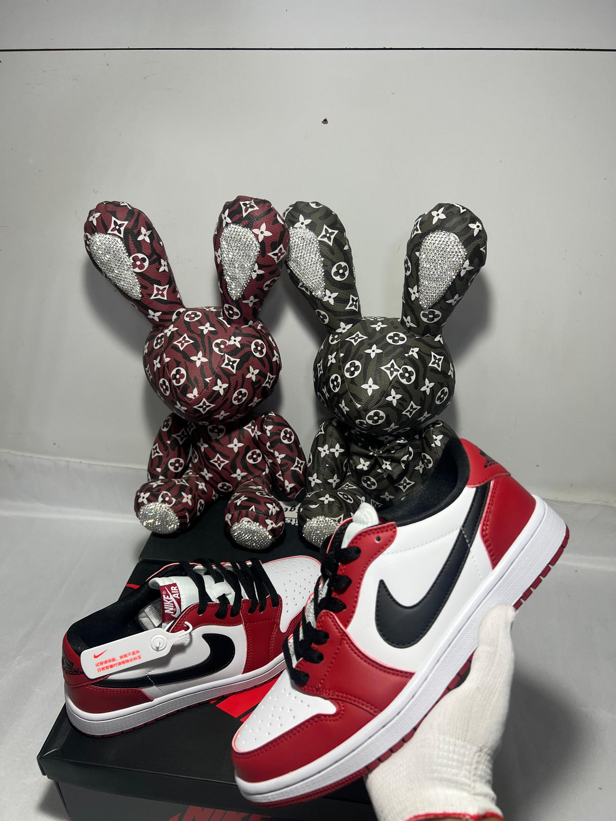Air Jordan 1 Low red white black sneakers at Meya Luxury Brand