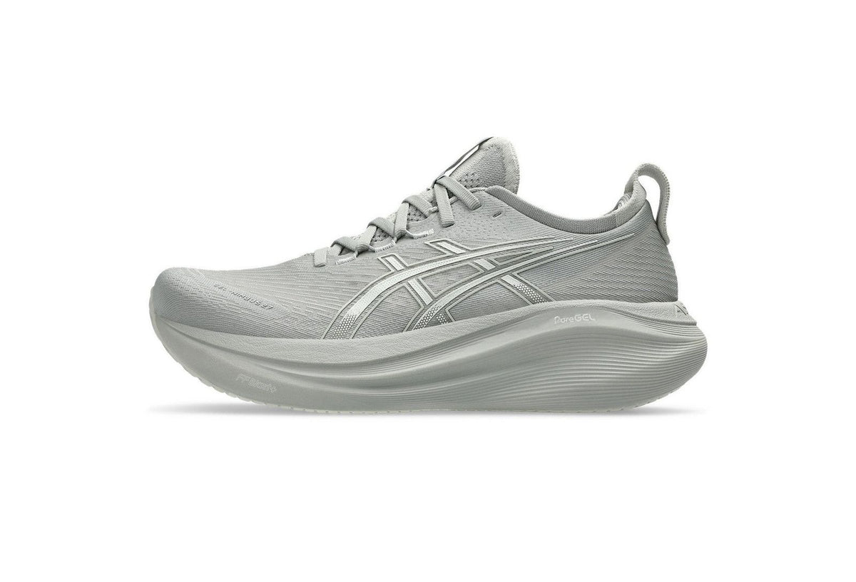 Side profile of ASICS GEL-NYC cream and grey sneaker