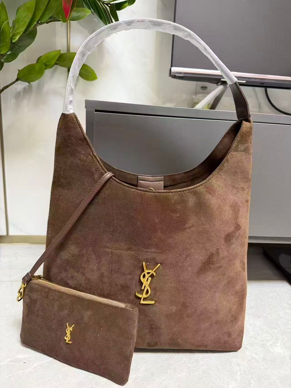 Brown YSL women’s hobo shoulder bag with matching pouch