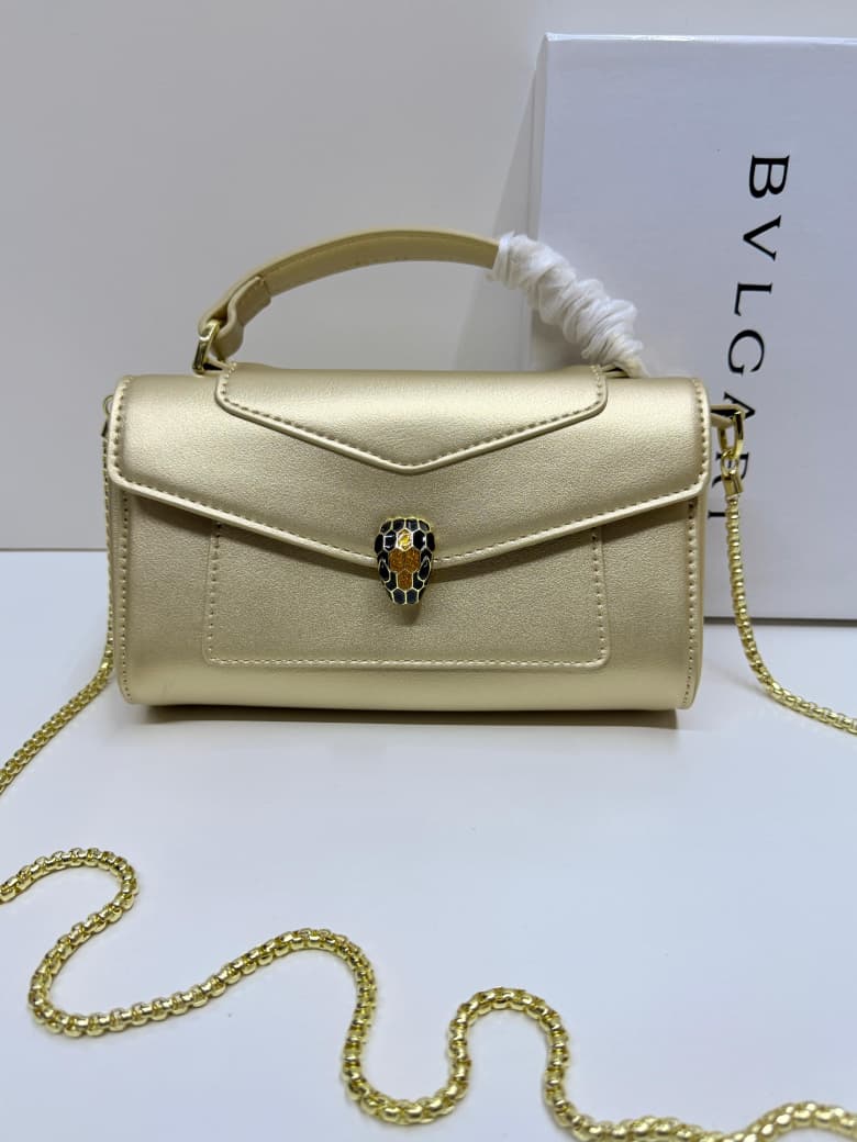 Beige BVLGARI mini bag with top handle and chain strap