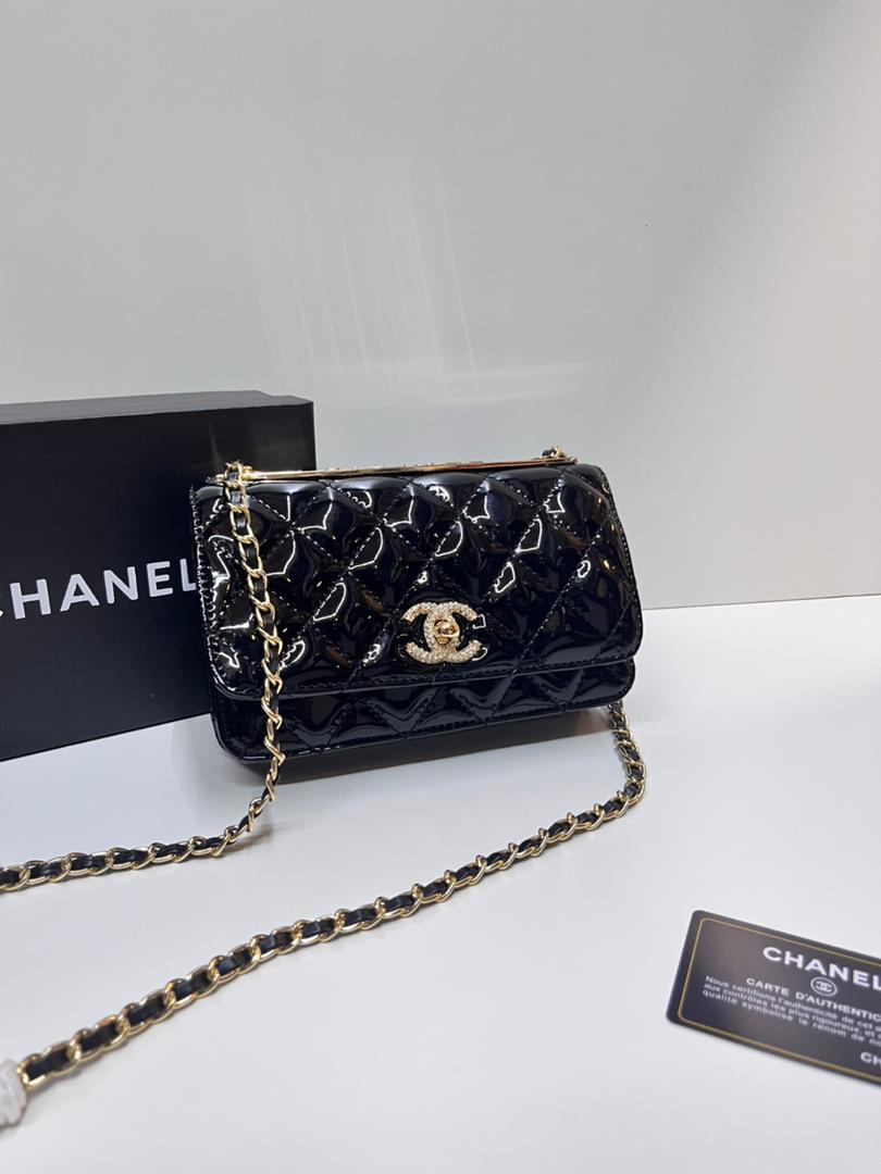 Black patterned Chanel mini flap bag