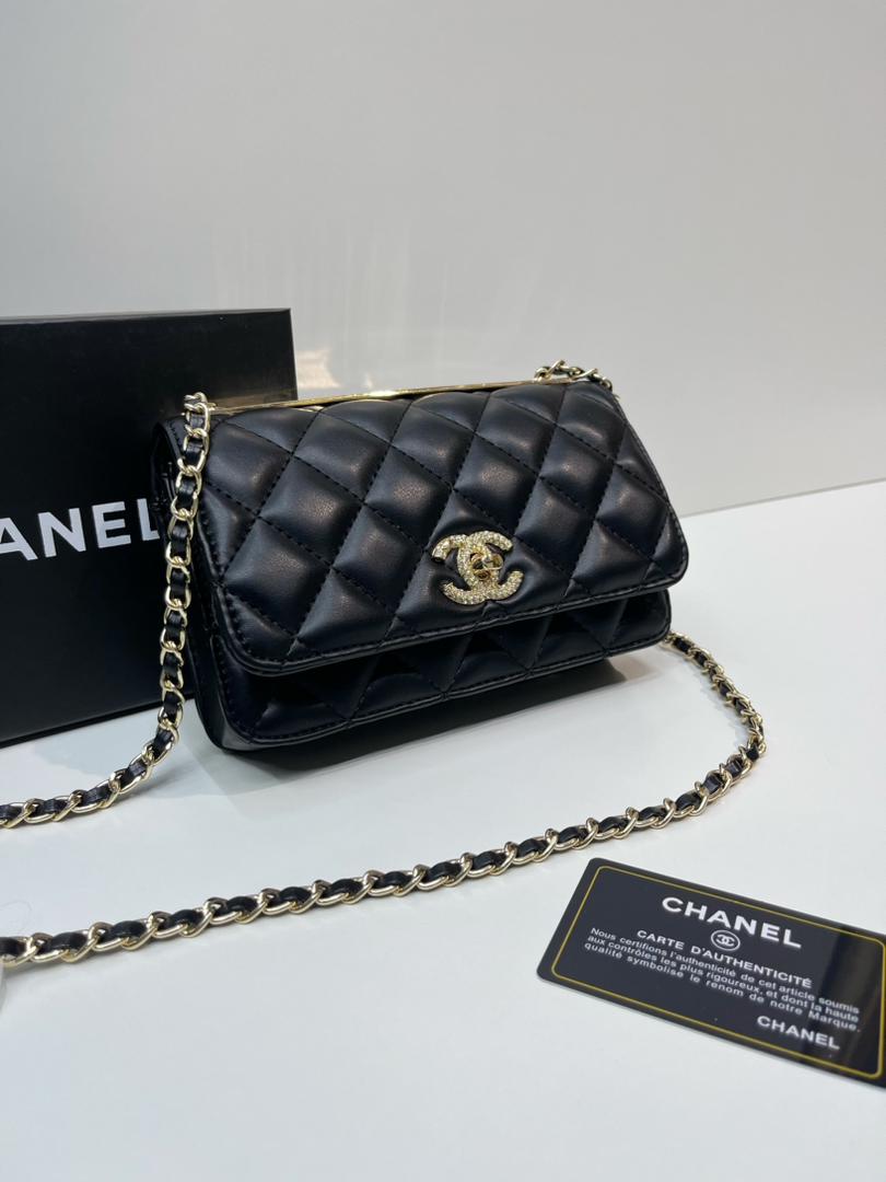 Black Chanel quilted crossbody bag with chain strap