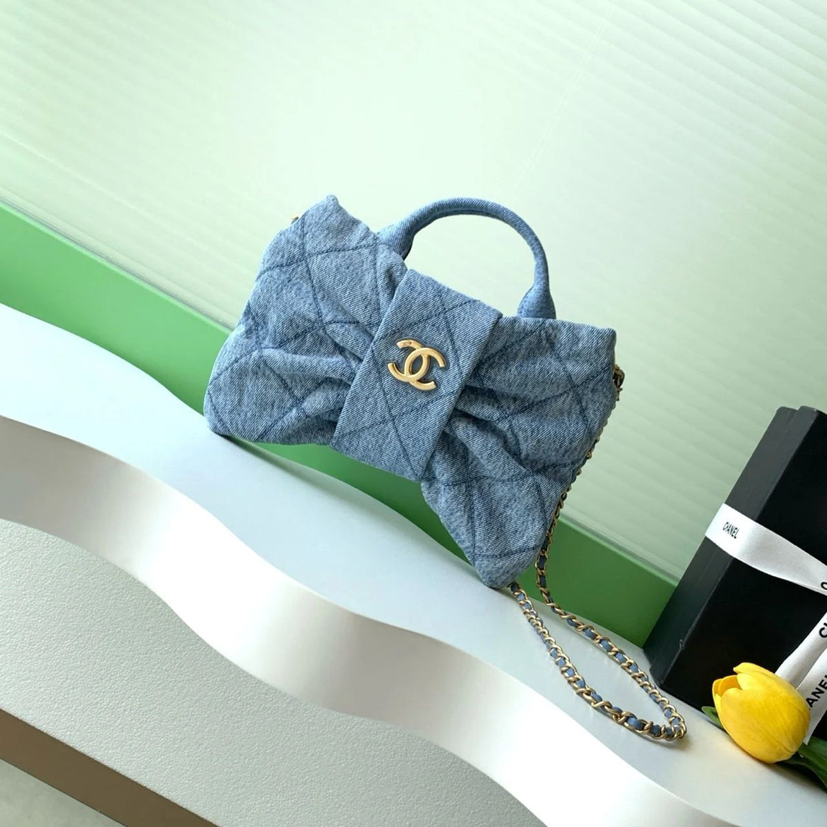Blue Chanel quilted bag with top handles