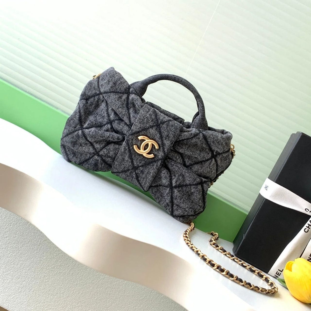 Grey Chanel quilted women’s handbag with chain strap