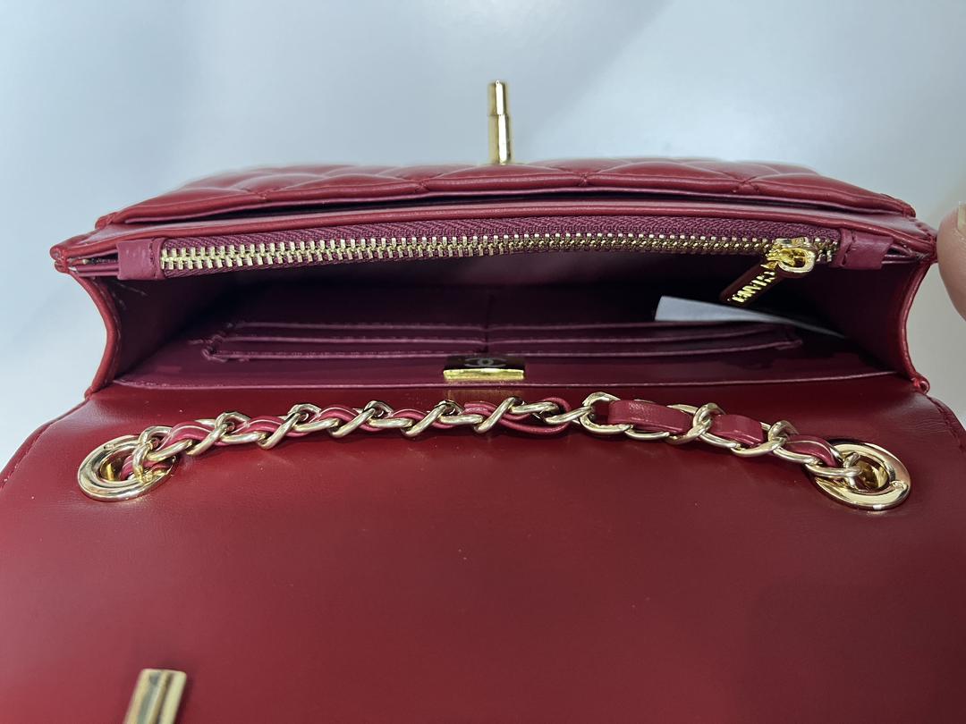 Interior view of burgundy Chanel mini flap bag