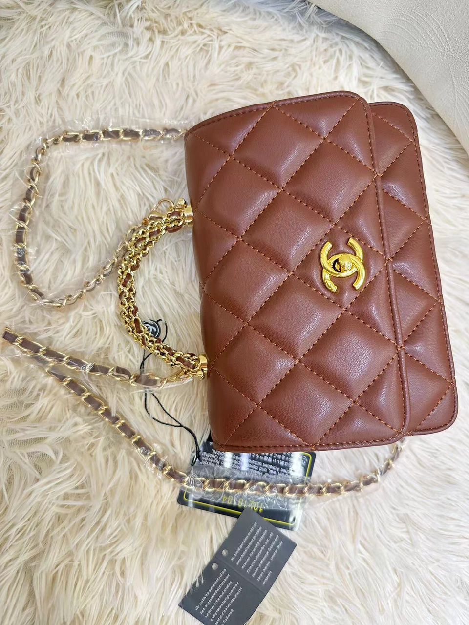 Chanel quilted leather mini flap bag in chestnut brown with gold CC turn-lock by Meya Luxury Brand