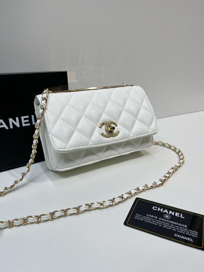 White Chanel mini crossbody bag with gold-tone chain