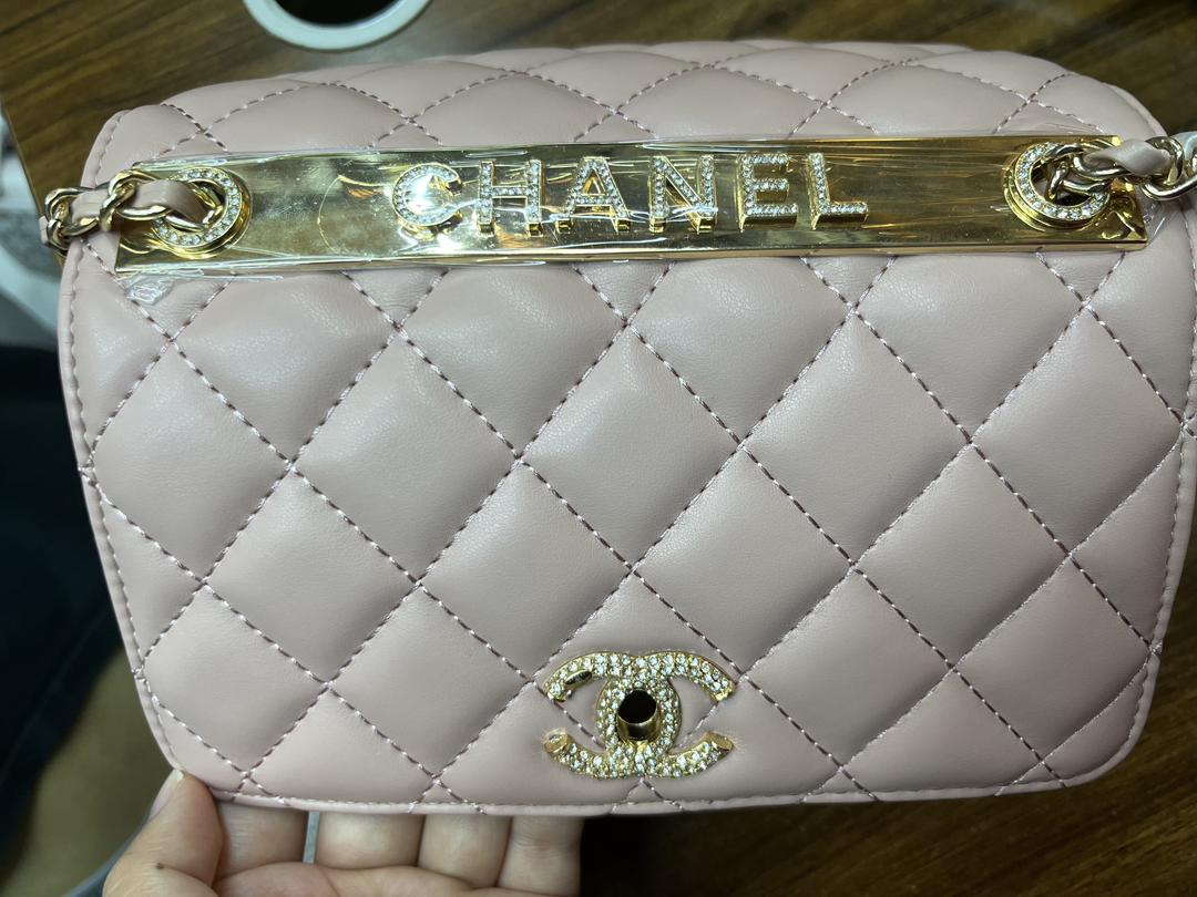 White Chanel quilted mini flap bag with chain strap