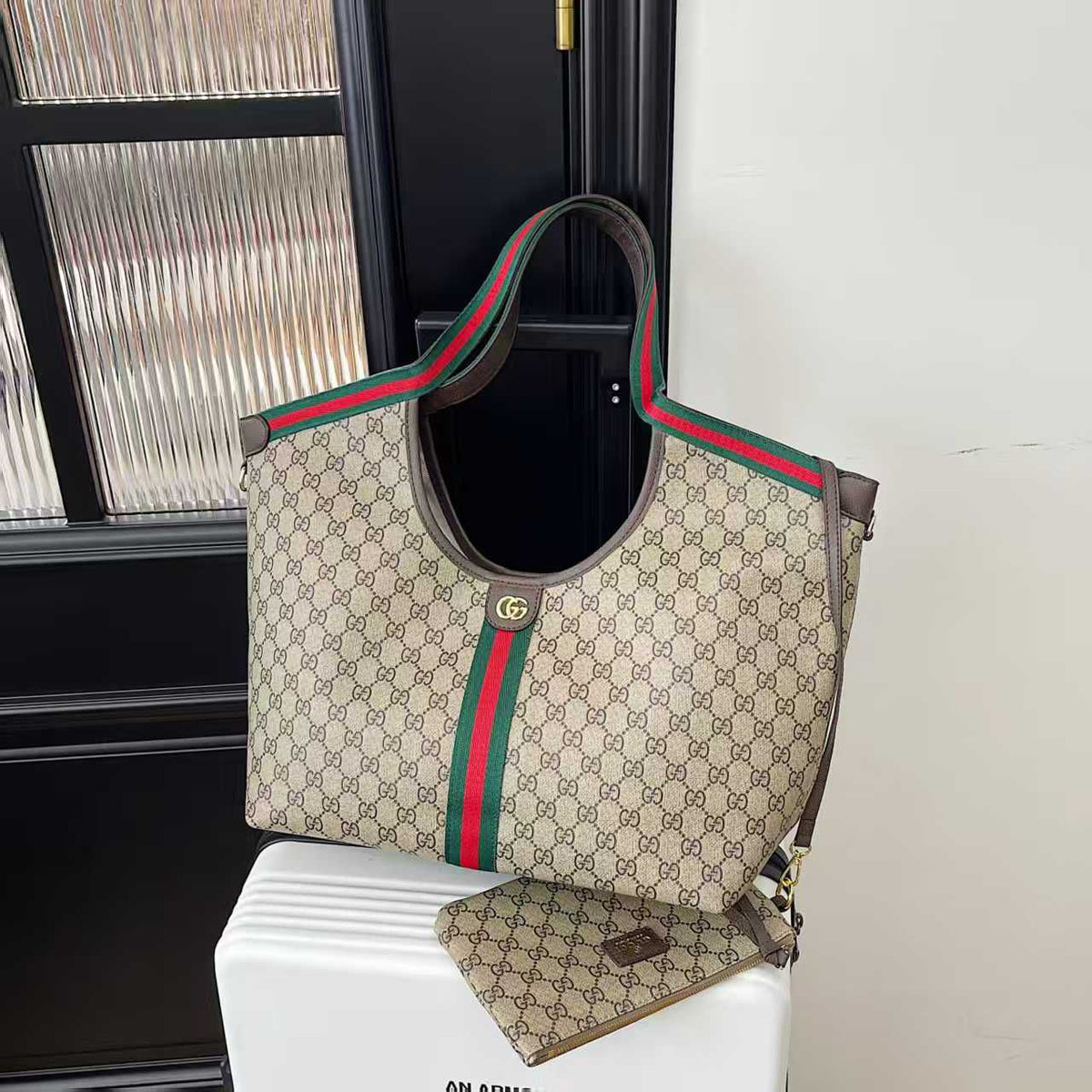 Beige Gucci monogram tote bag with striped detail