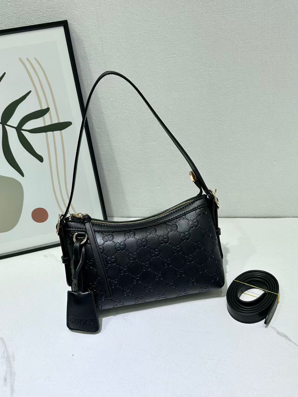 Black Gucci women’s compact crossbody bag