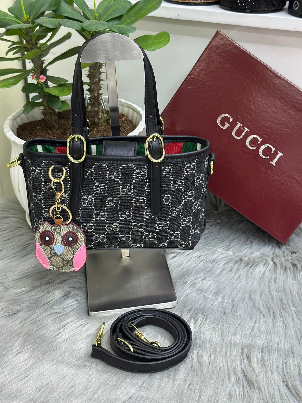 Charcoal black Gucci GG monogram canvas tote bag with black leather handles