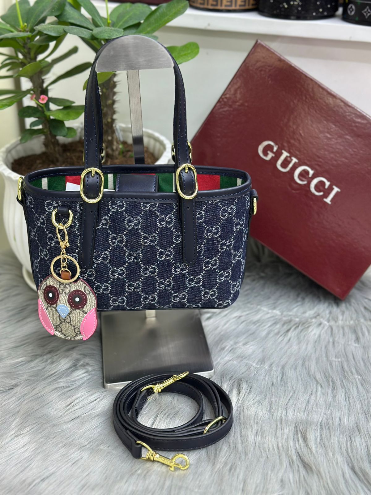 Navy blue Gucci GG canvas tote shoulder bag with leather handles