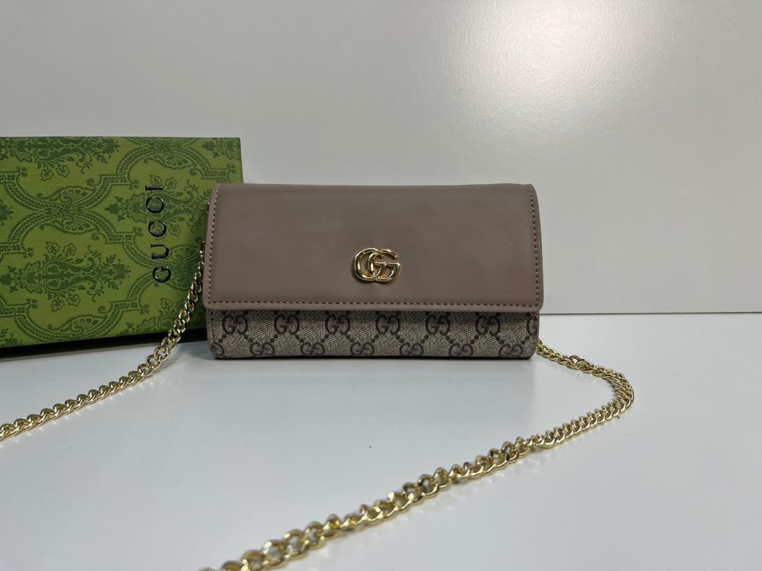 Taupe Gucci women’s crossbody bag with gold-tone chain