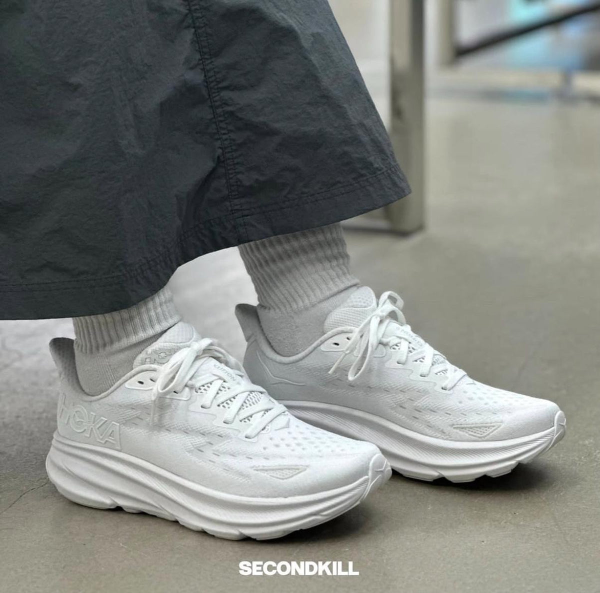 HOKA Bondi 9 white sneakers at Meya Luxury Brand