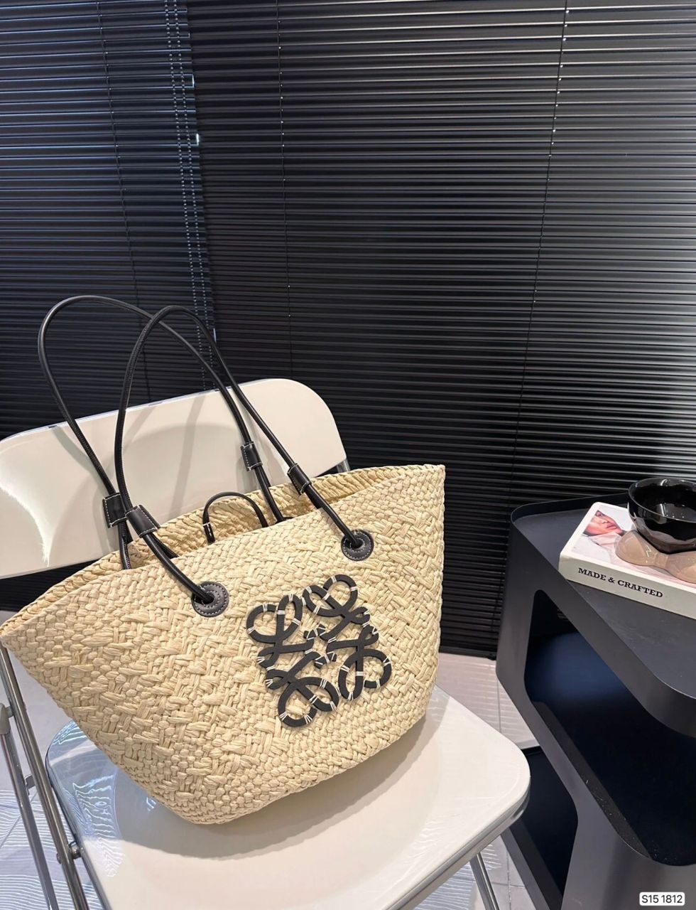 Beige Loewe basket bag with woven texture and leather handles