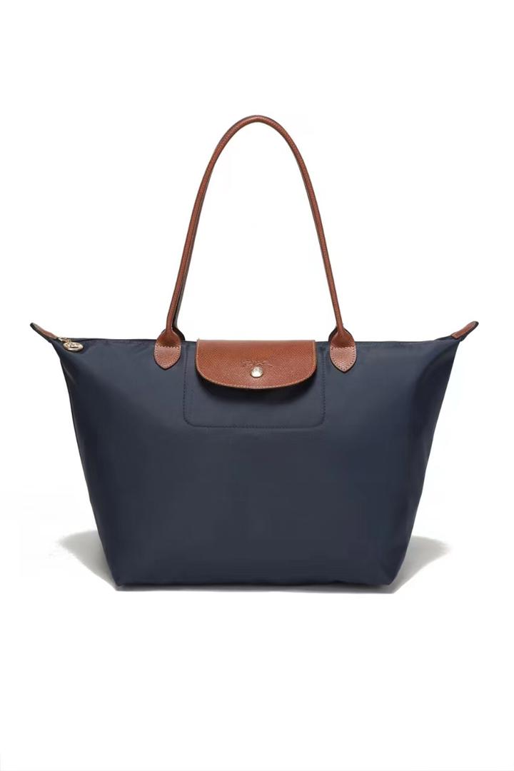 Navy Longchamp tote bag with brown handles