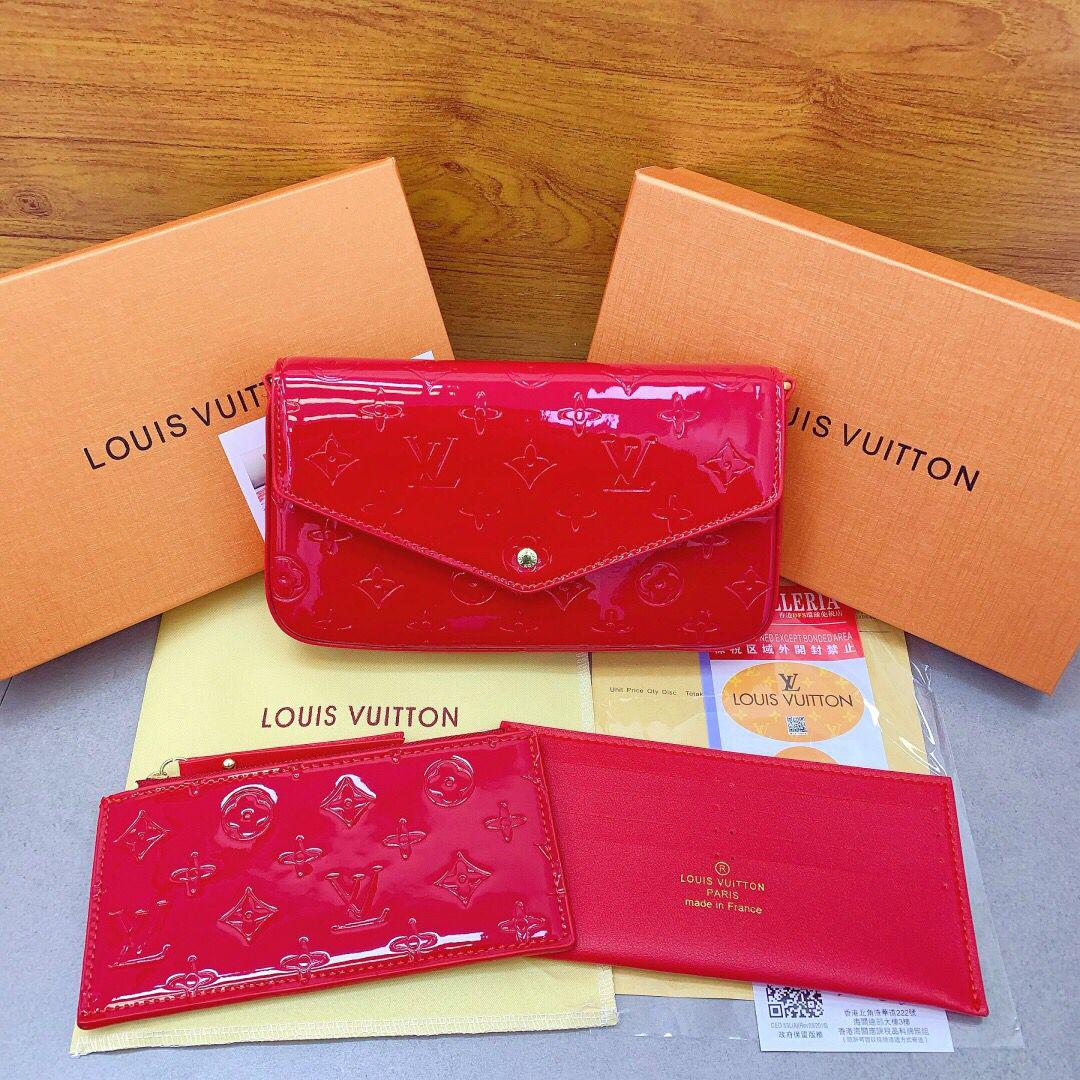 Red Louis Vuitton women’s wallet-on-chain bag