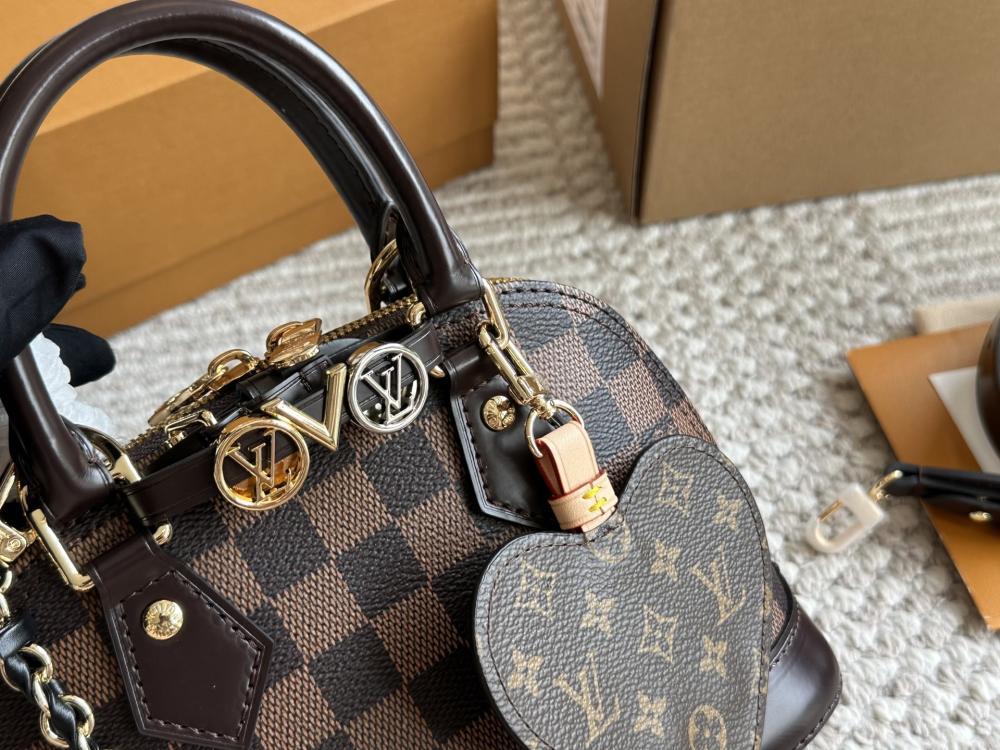 Front view of brown patterned women’s mini bag