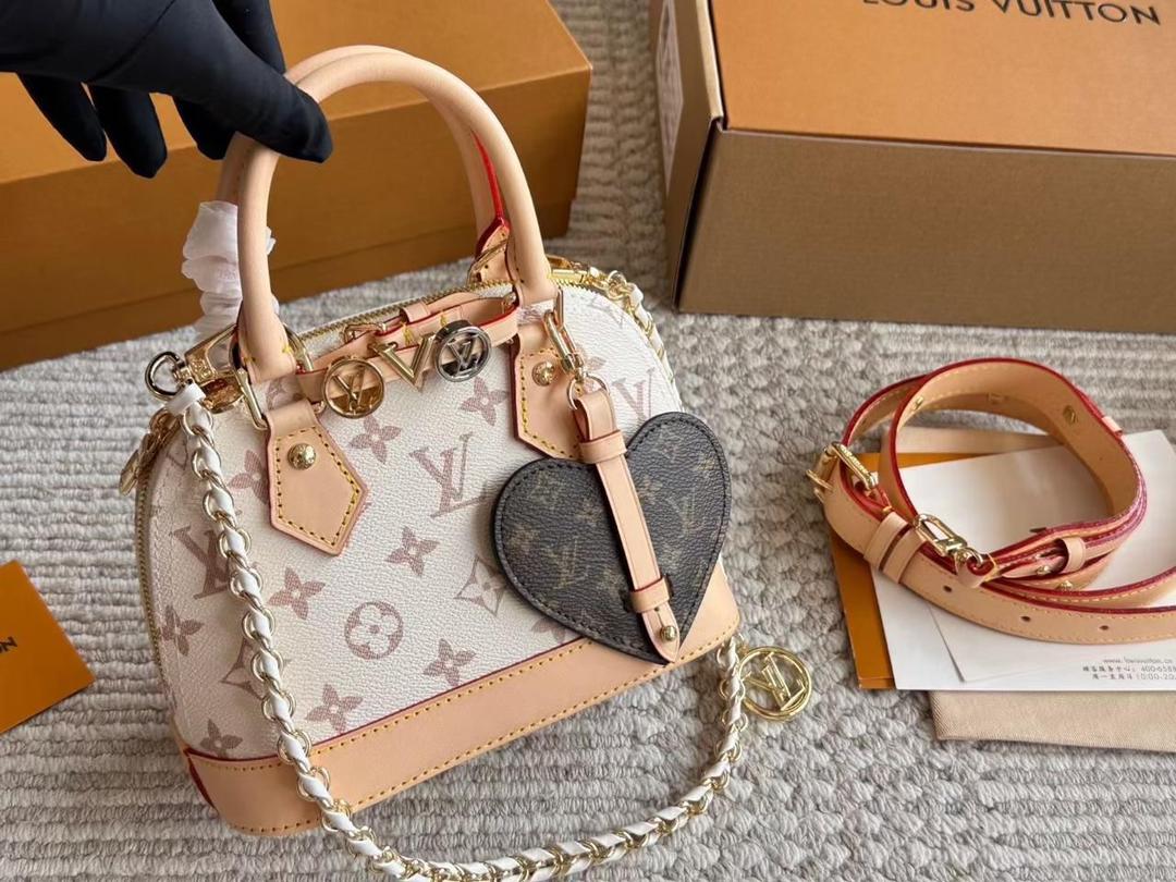 Cream patterned women’s mini top-handle bag