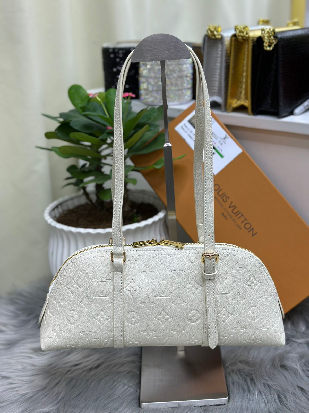 Off-white Louis Vuitton monogram empreinte leather East-West shoulder bag