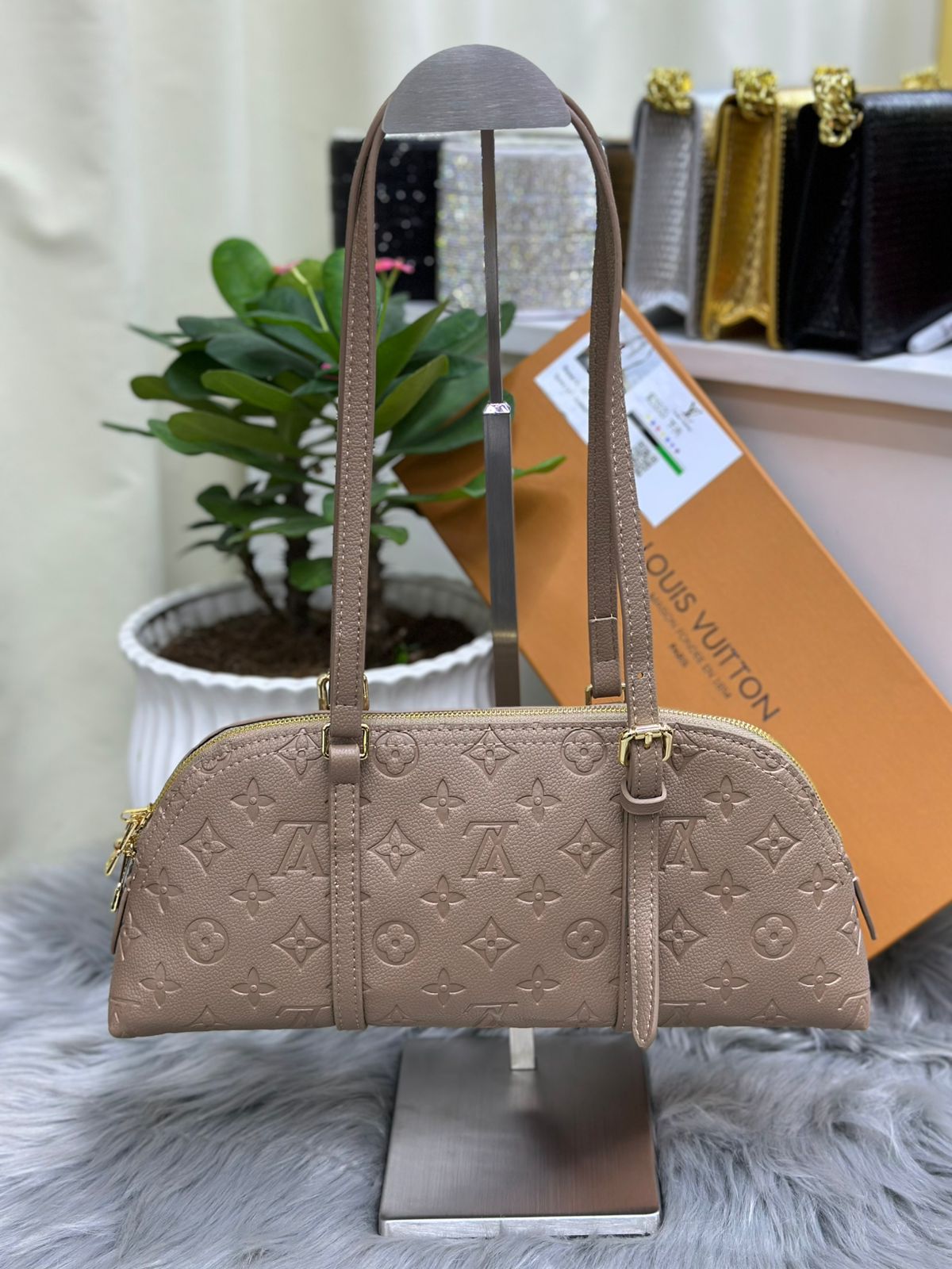 Taupe beige Louis Vuitton monogram embossed leather shoulder handbag