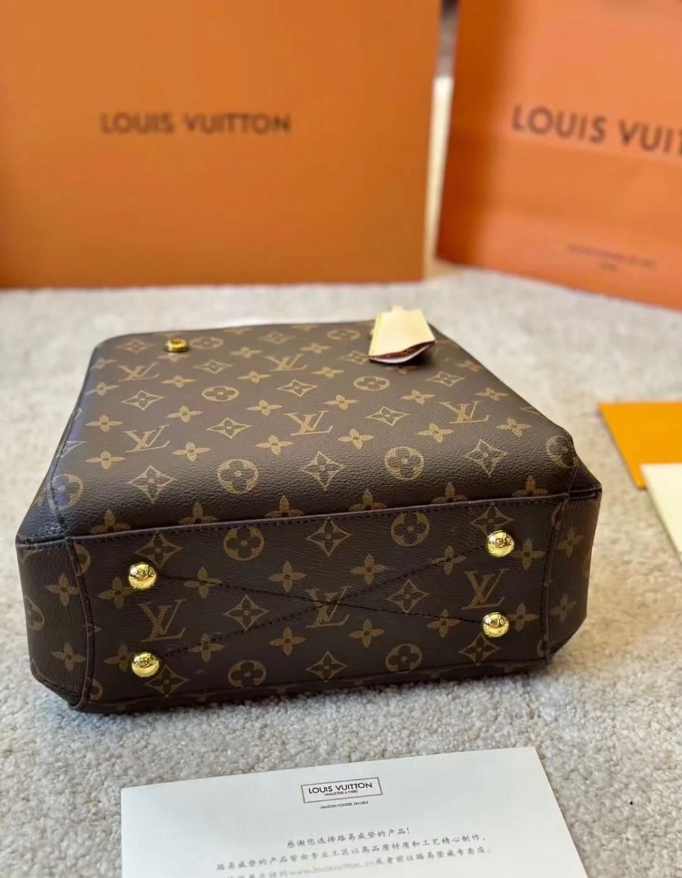 Louis Vuitton style monogram handbag bottom view