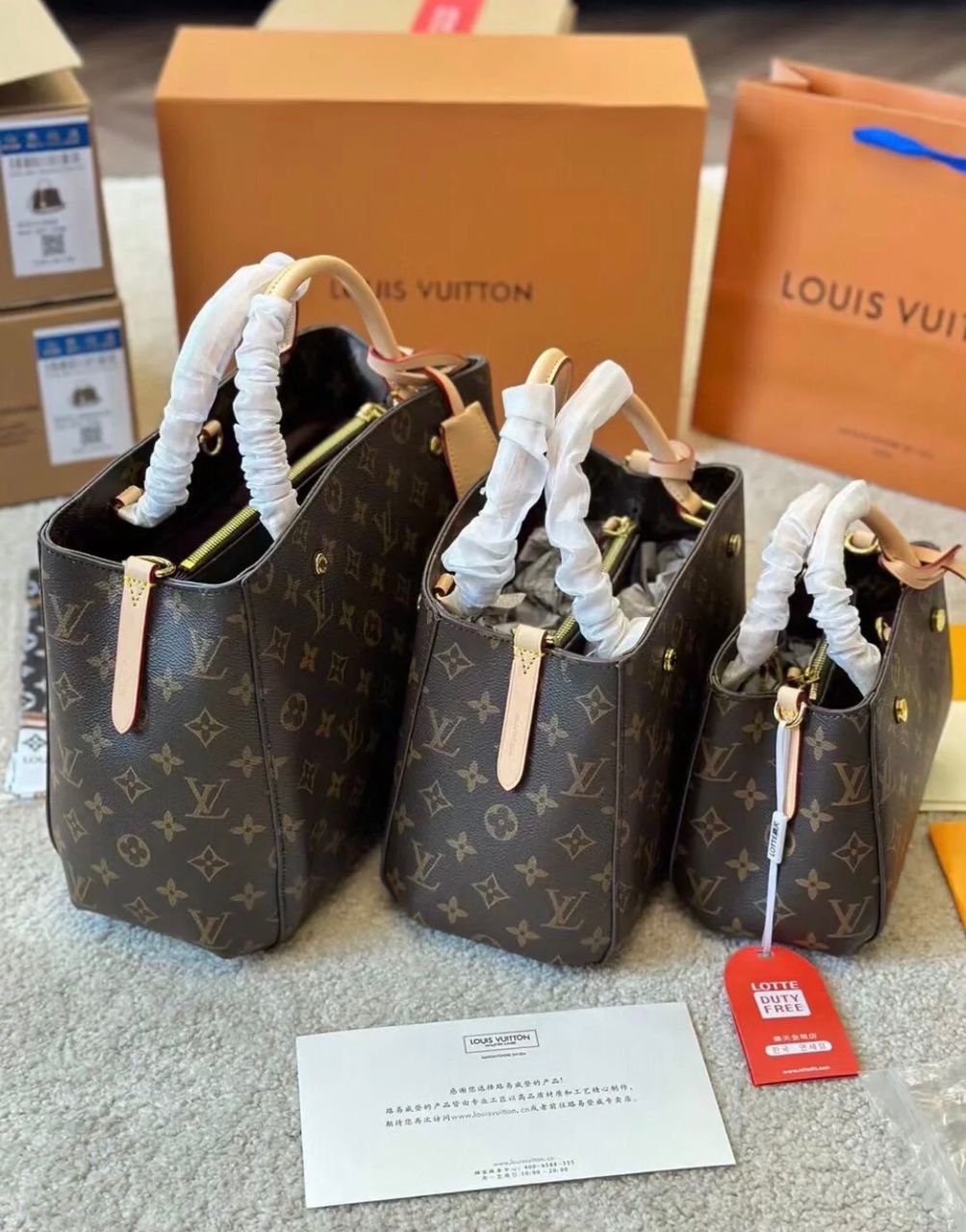 Louis Vuitton style monogram handbags displayed in multiple sizes