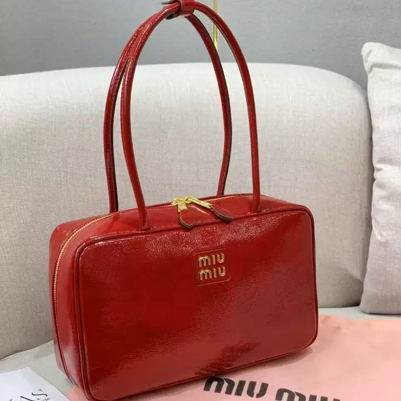 Vibrant red Miu Miu leather top handle handbag with gold hardware