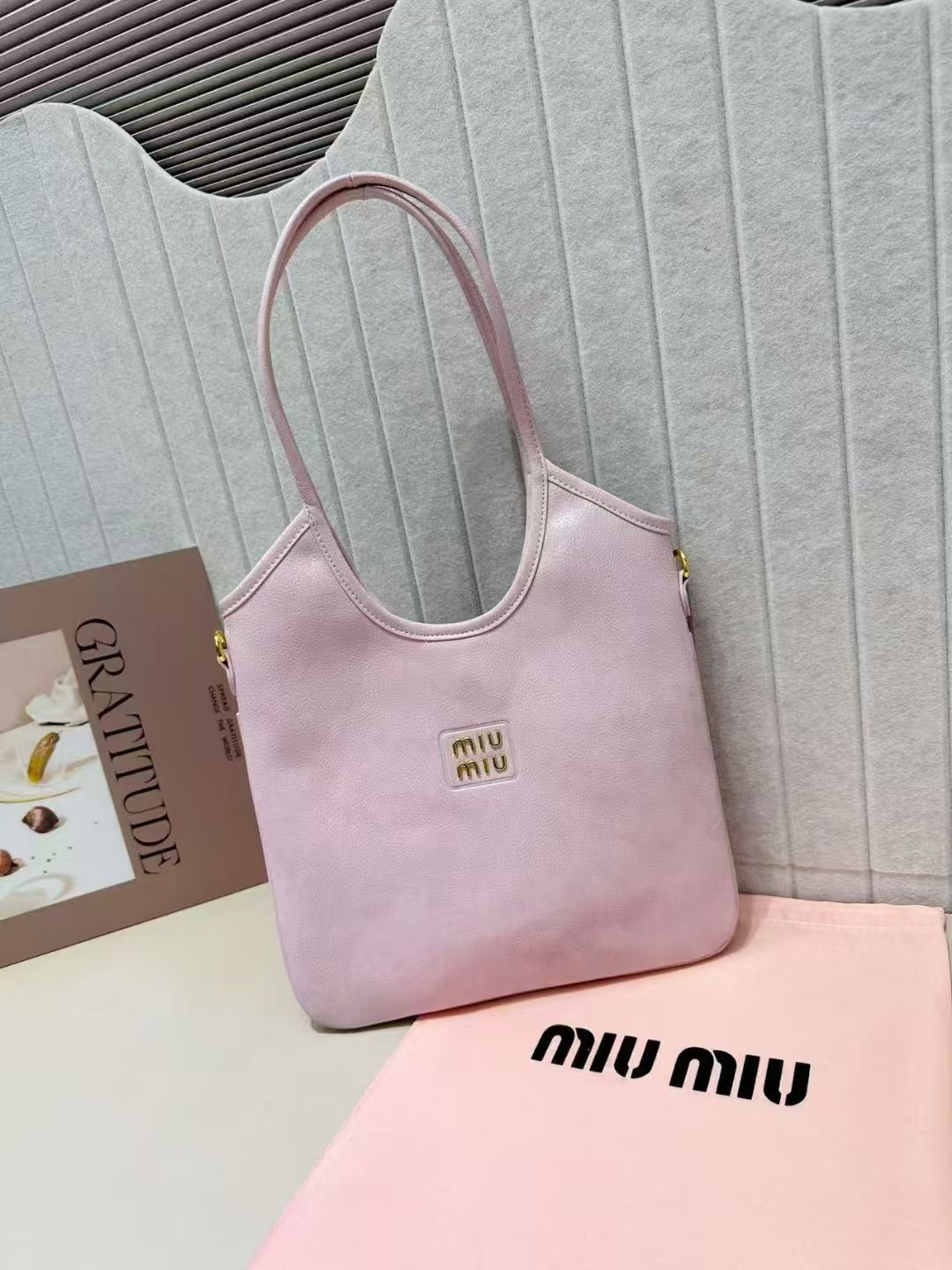 Soft rose pink Miu Miu leather shoulder bag with gold metal logo