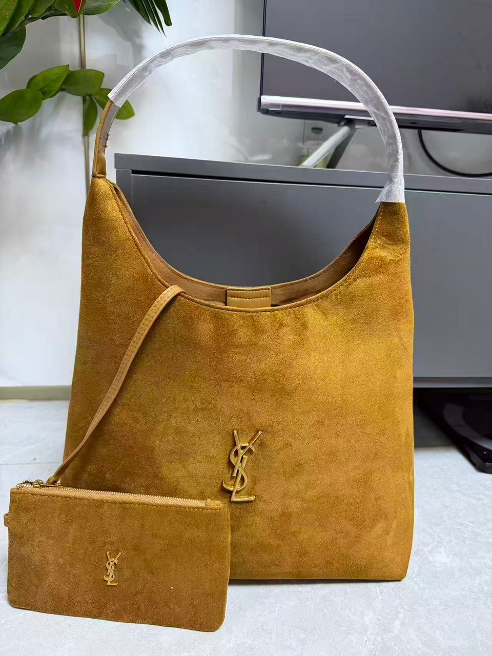 Mustard YSL women’s hobo shoulder bag with pouch