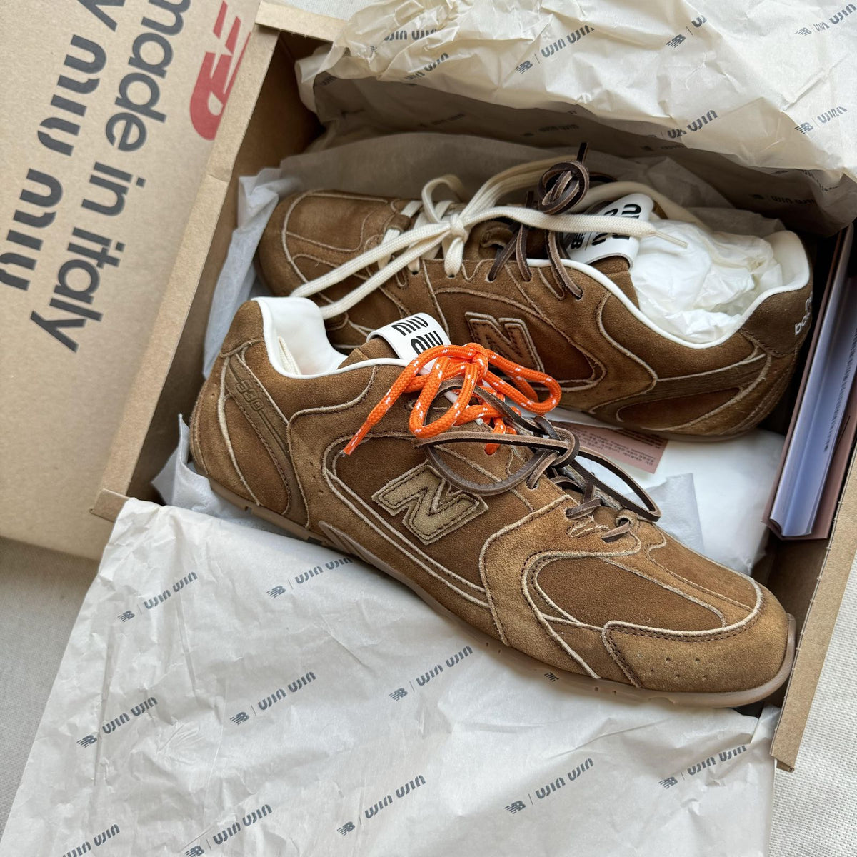 Miu Miu 530 SL Cinnamon sneakers with orange laces