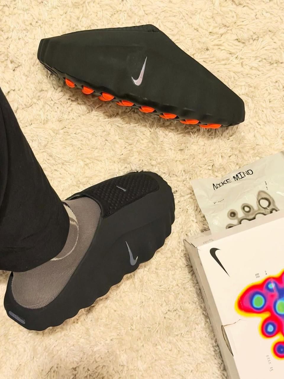 Nike Mind 001 Black Hyper Crimson mules at Meya Luxury Brand