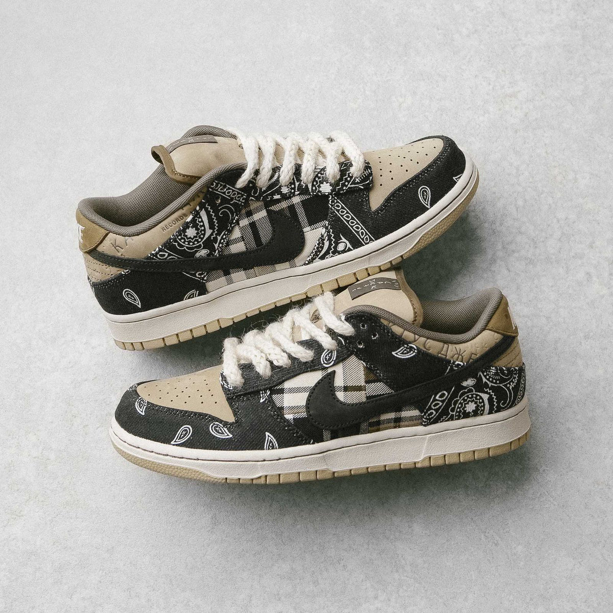 Pair of Travis Scott Cactus Jack Nike SB Dunk shoes