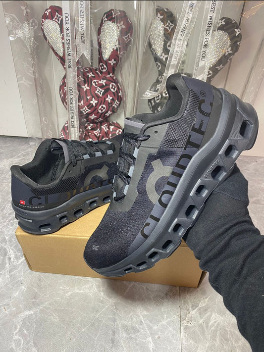 On Cloudmonster Black Magnet running shoes in UAE