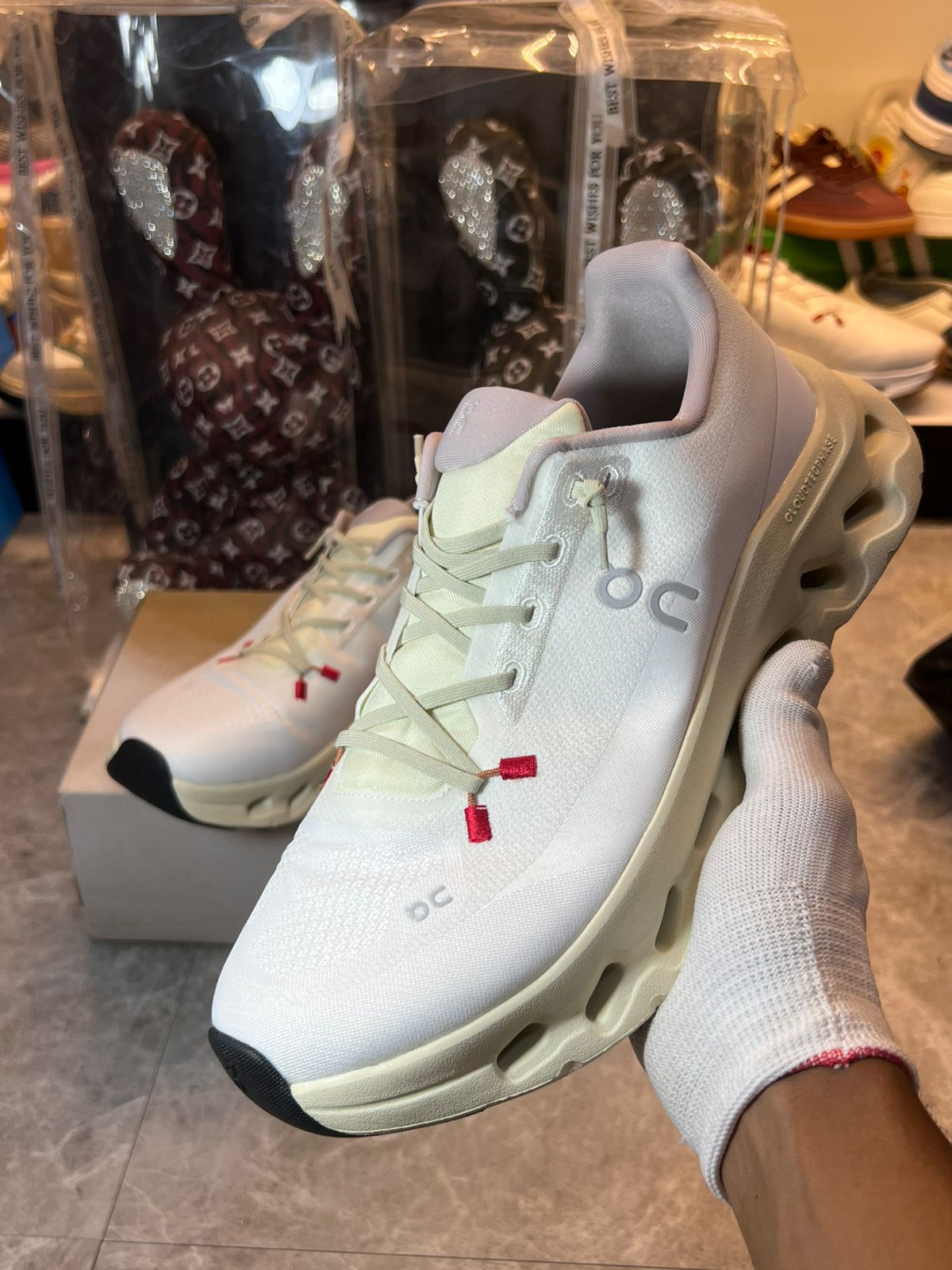 On Cloudtilt white and ivory sneakers at Meya Luxury Brand
