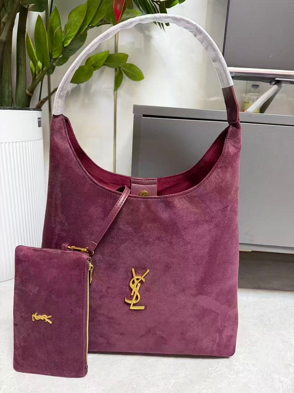 Pink YSL women’s hobo shoulder bag with matching pouch